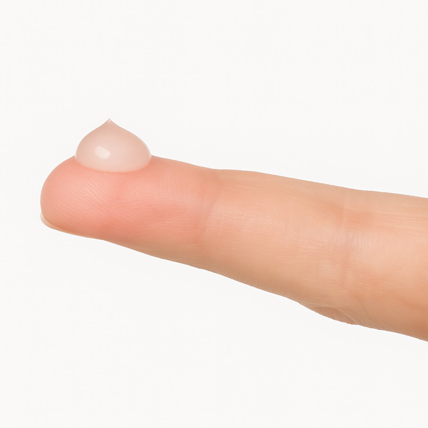 Blessand portioniert auf einem Finger.